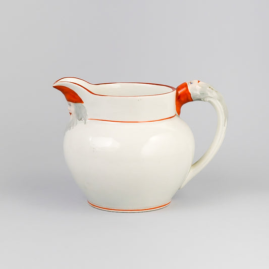 Kanna från Rörstrand med tomtemotiv, 1910-1920-tal. 10cm hög. Santa Claus pitcher by Rörstrand, 1910’s-1920’s. H: 10cm/3,9″