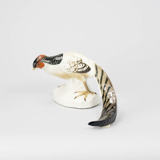 Figurin från Rörstrand med underglasyrmålning. Märkt Rörstrand. 11cm hög och 25cm lång. Early Rörstrand Figurine. Marked Rörstrand. H: 11cm/4,3" and W: 25cm/9,8"
