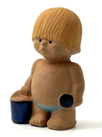 VÃ¤st a Lisa Larson figurine in the series "Children of the World" by Gustavsberg. H: 13cm/5
