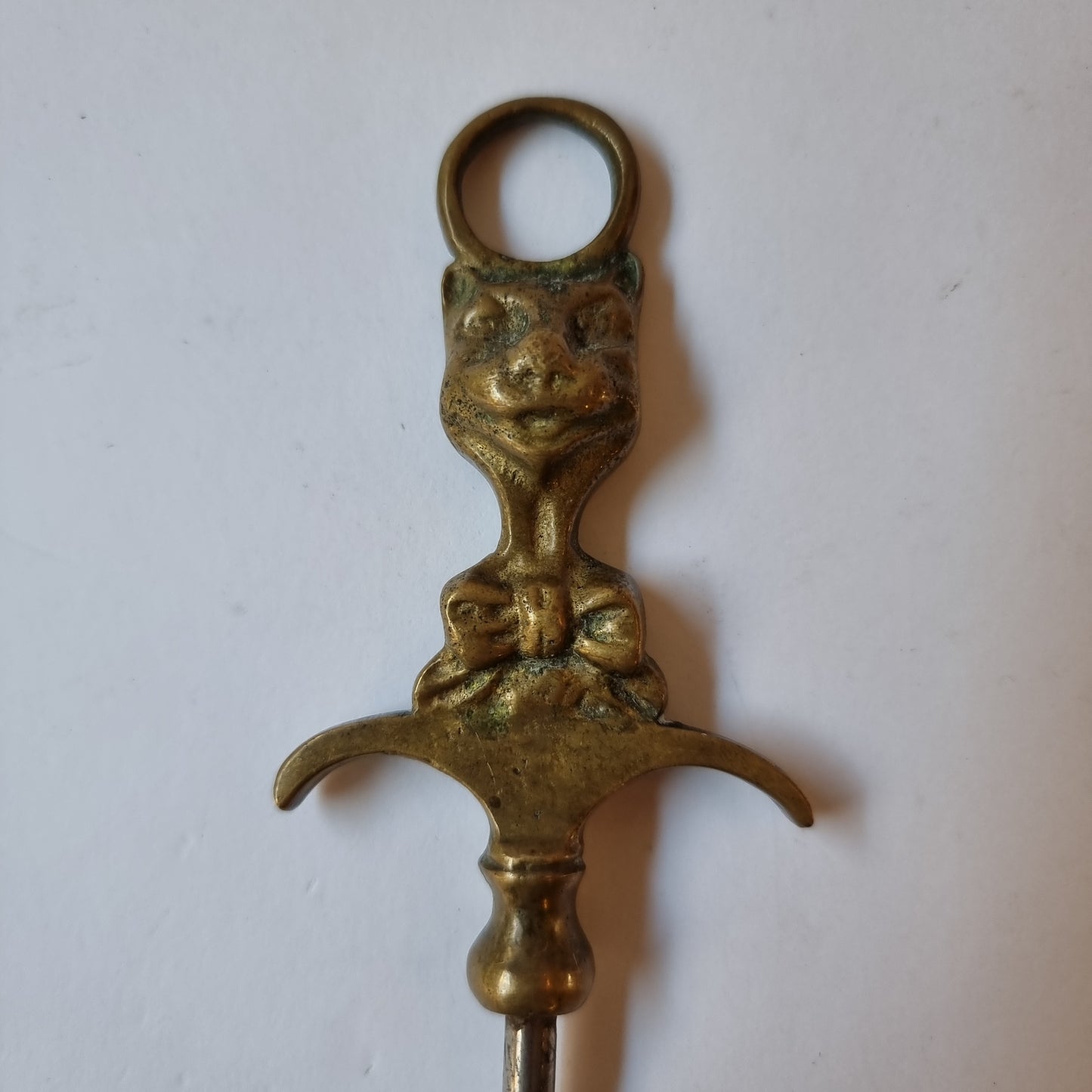 Corkscrew brass feline