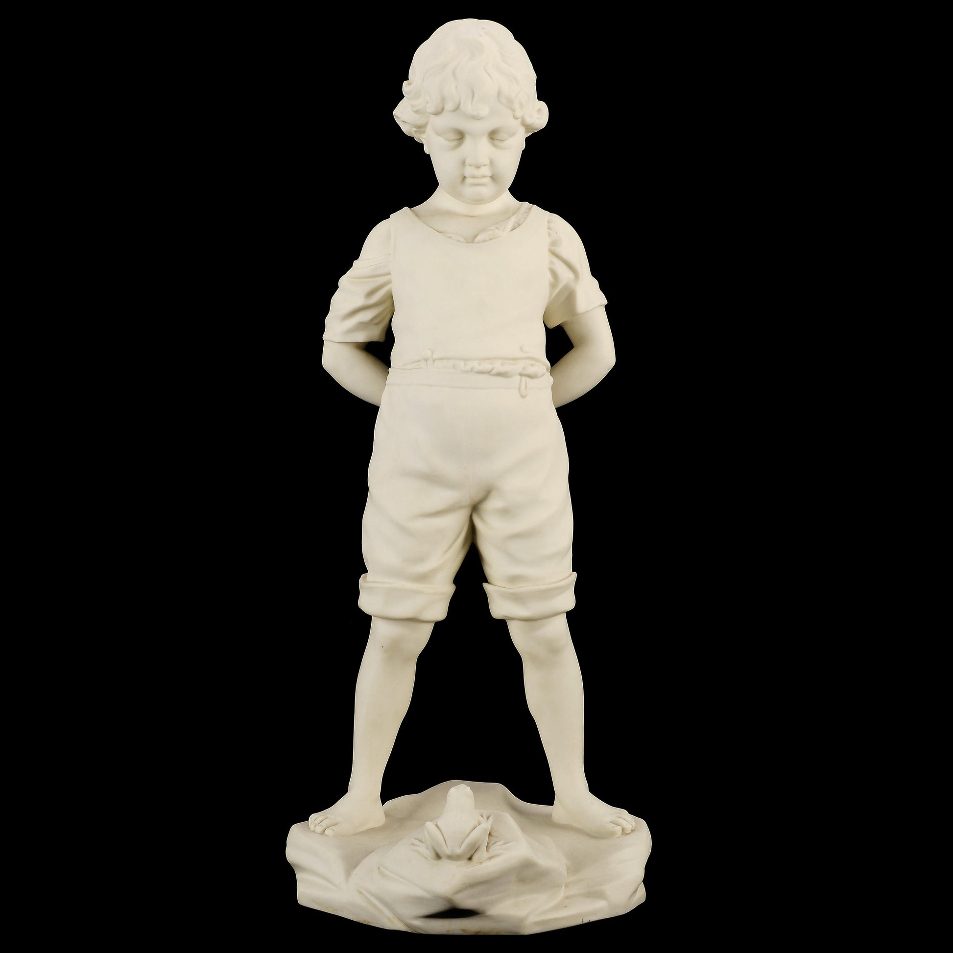 Parianfigurin från Gustavsberg, "Pojken och Grodan". 49cm hög. Märkt GUSTAVSBERG 1922. Parian figurine, "Boy and the Frog" by Gustavsberg. H: 49cm/19,3". Marked GUSTAVSBERG 1922.